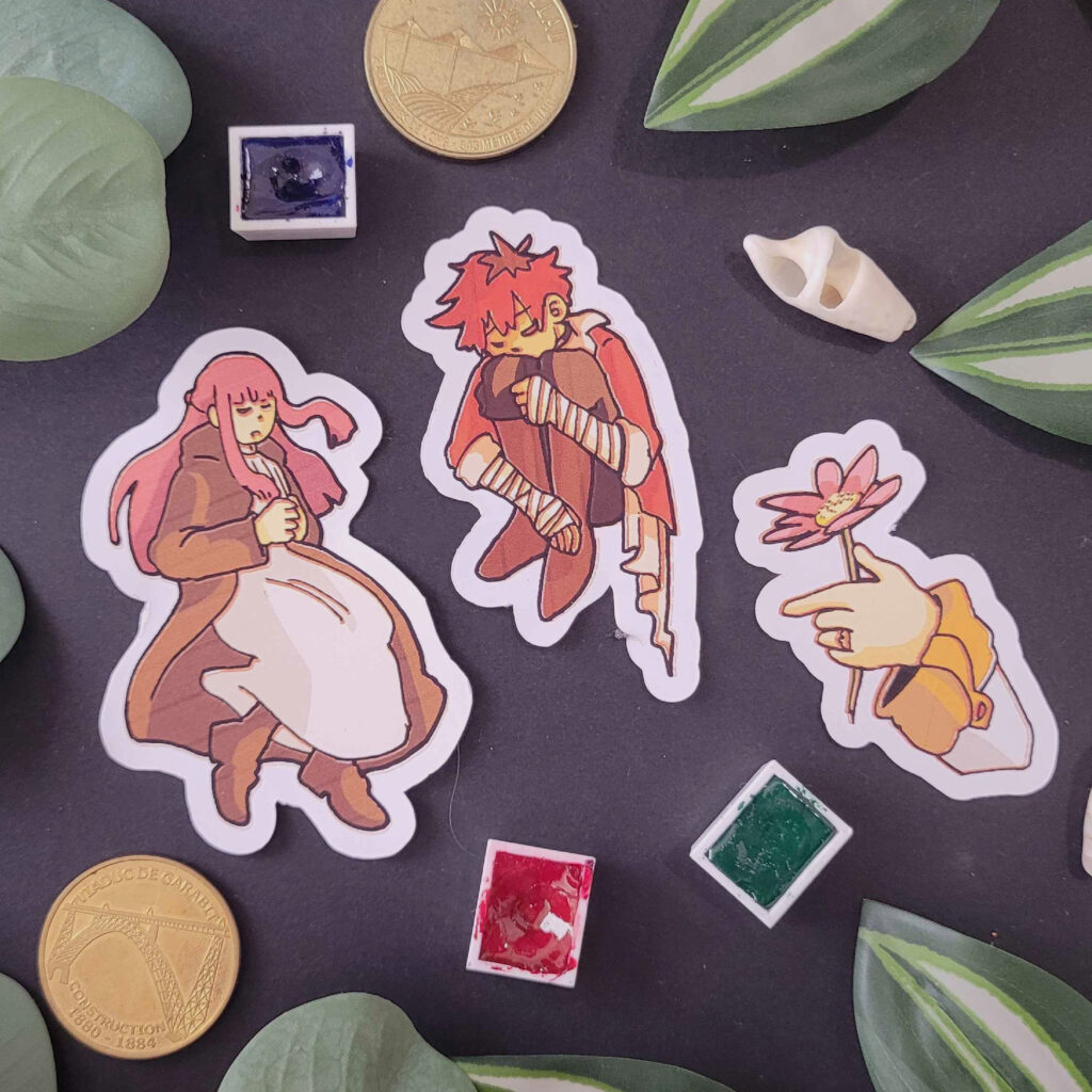3 stickers de la série Friren, un de Ferne en train de dormir, un de Stark en train de dormir et un du bras gauche de Friren tenant une fleur